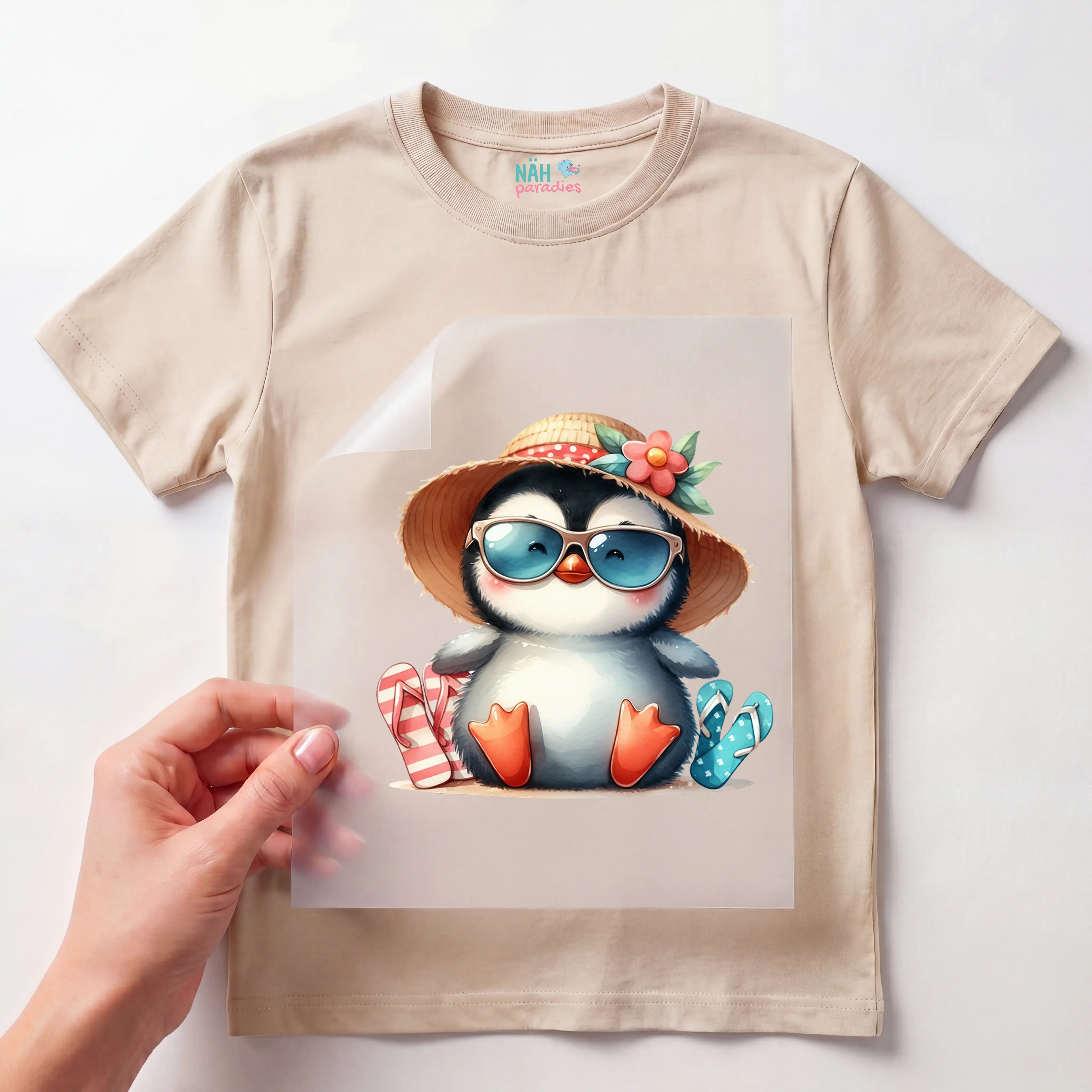 Bügelbild Pinguin Lotti im Urlaub