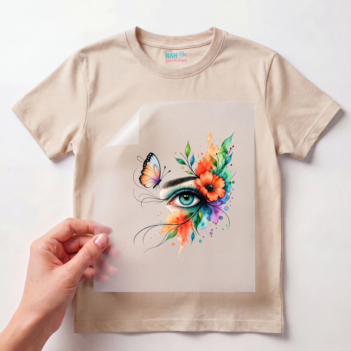 Bügelbild Auge mit Blumen Schmetterling