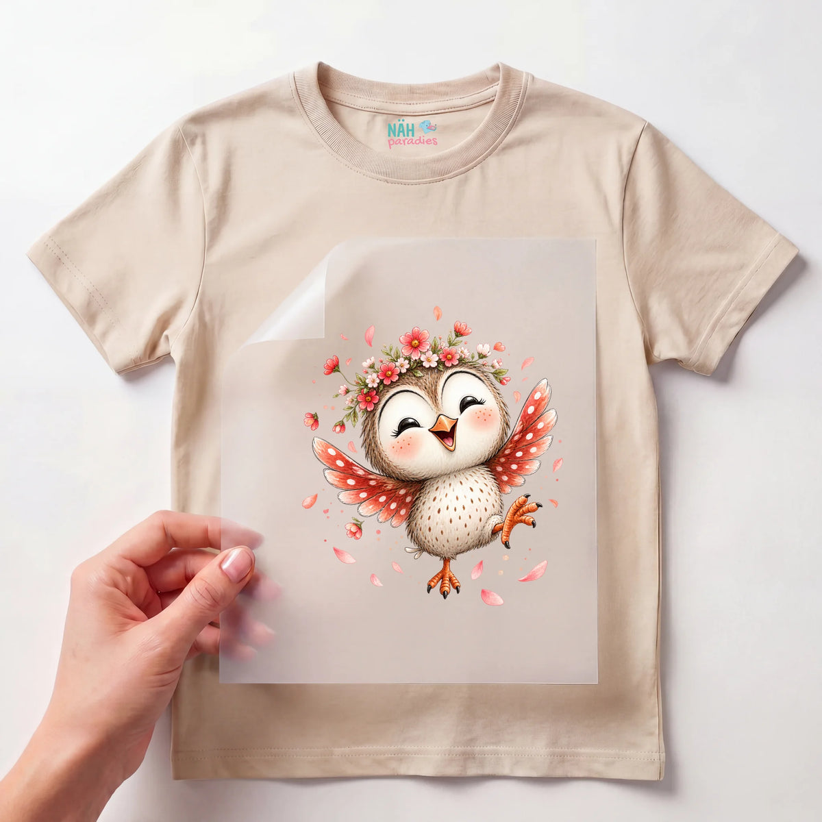 Bügelbild Vogel tanzt mit Blumenkranz