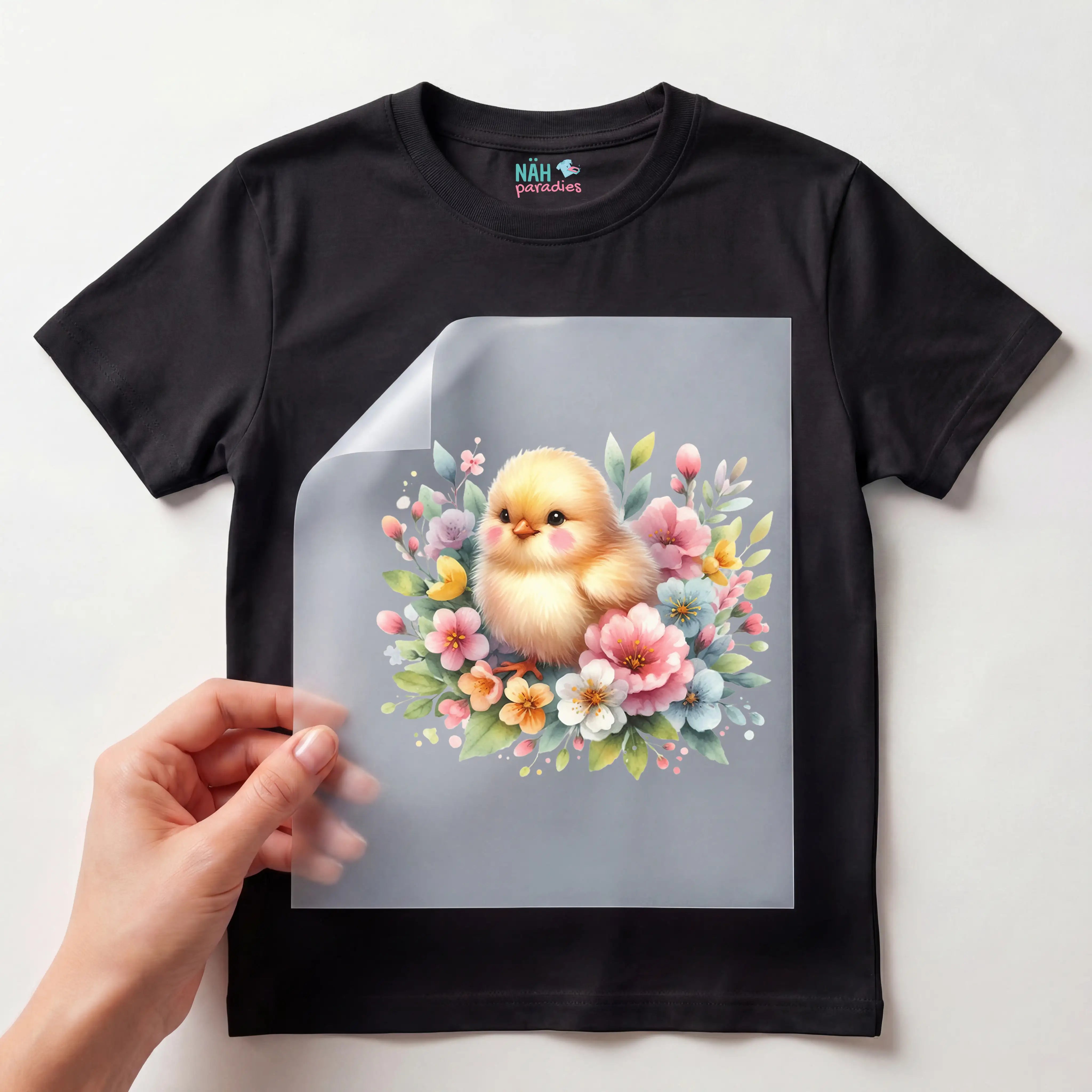Bügelbild Küken in Blütenpracht