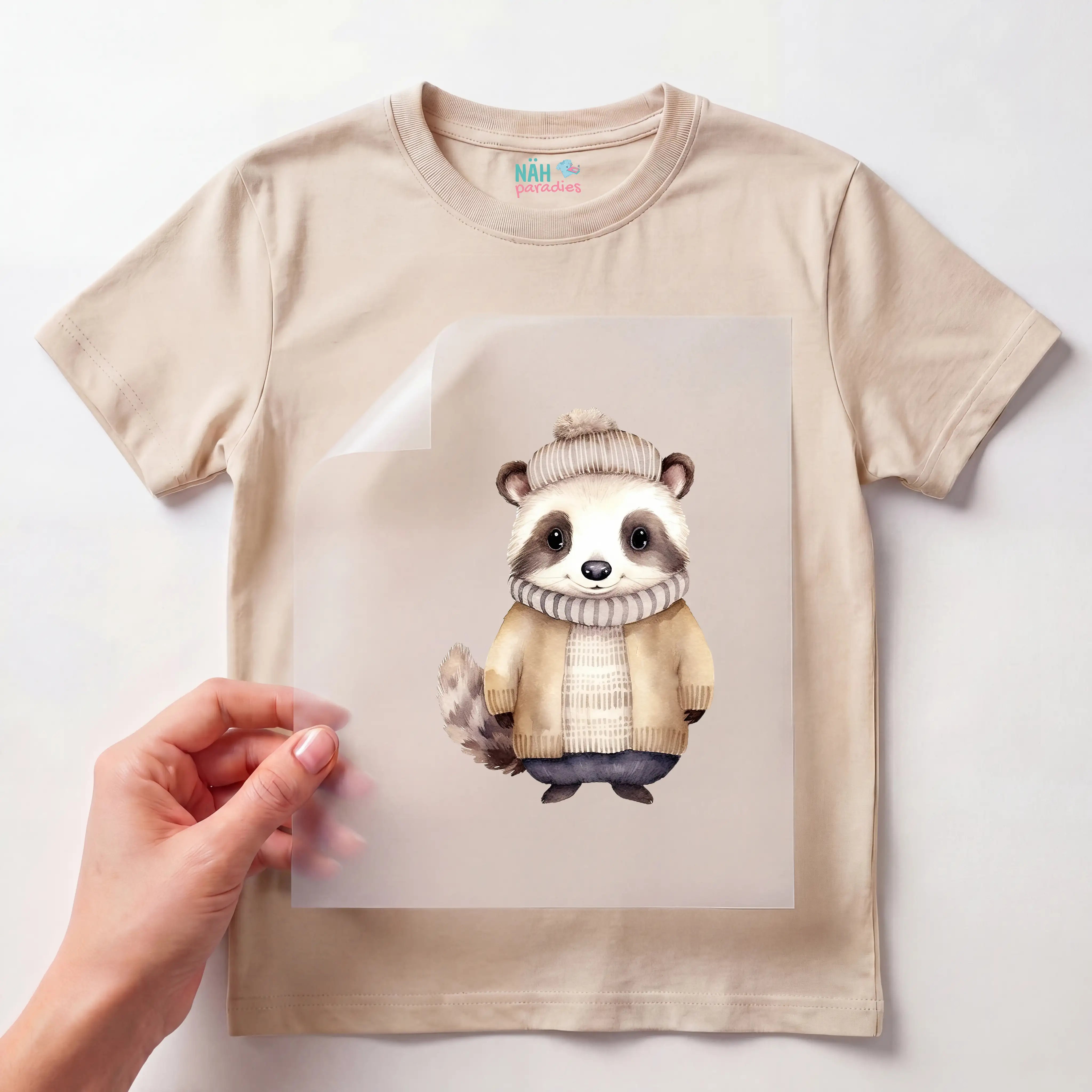 Bügelbild Winter Waschbär Hugo Beige