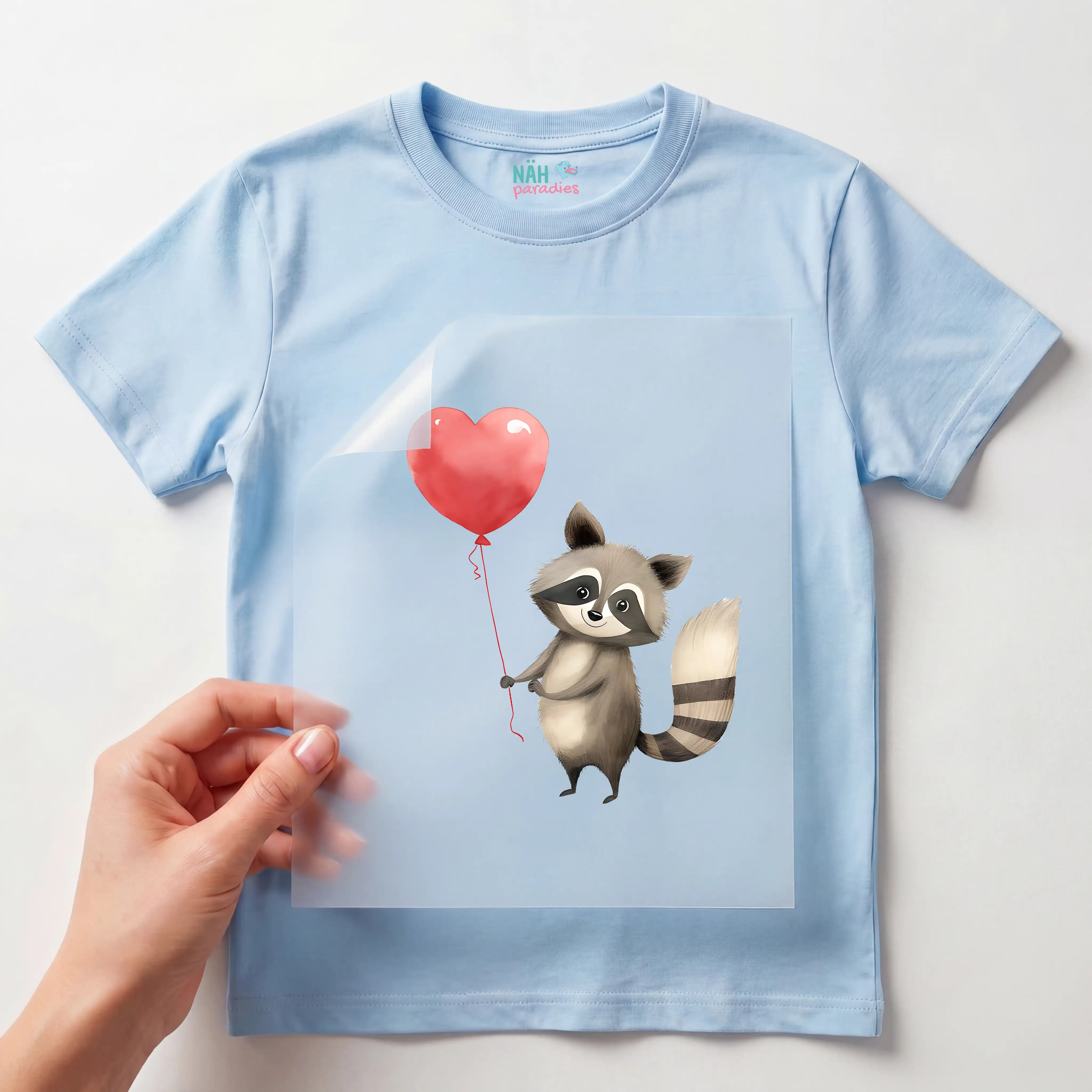 Bügelbild Waschbär Herzluftballon
