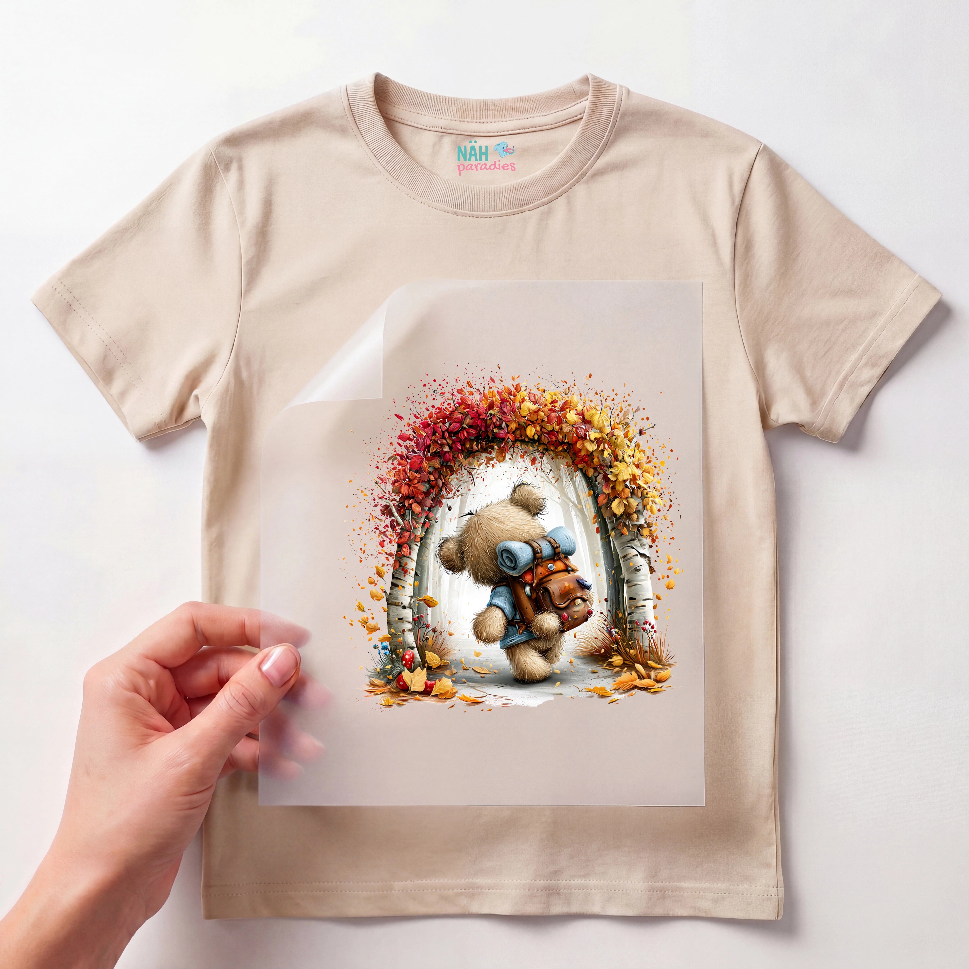 Bügelbild Teddybär im Herbstbogen