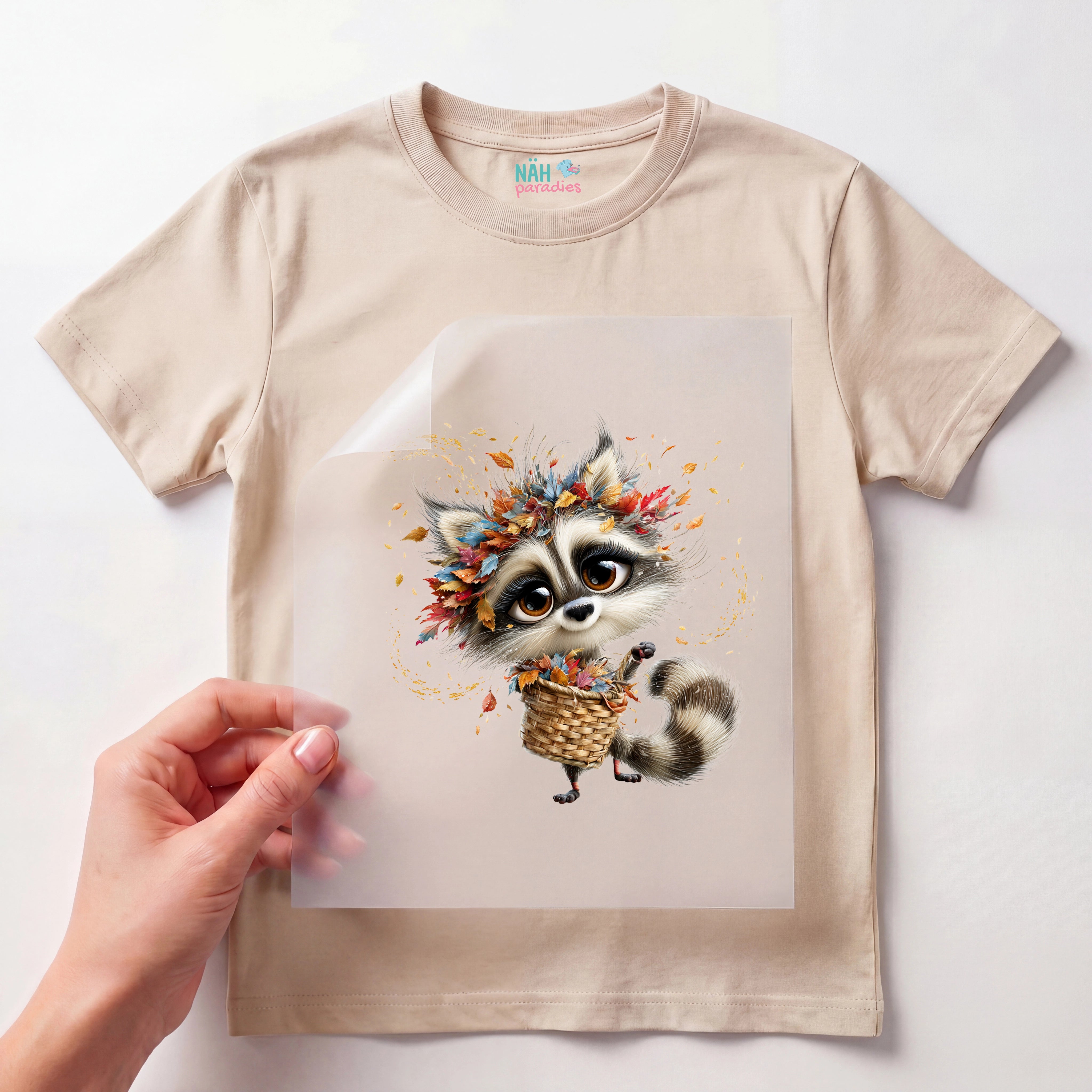 Bügelbild Waschbär mit Blätterkorb