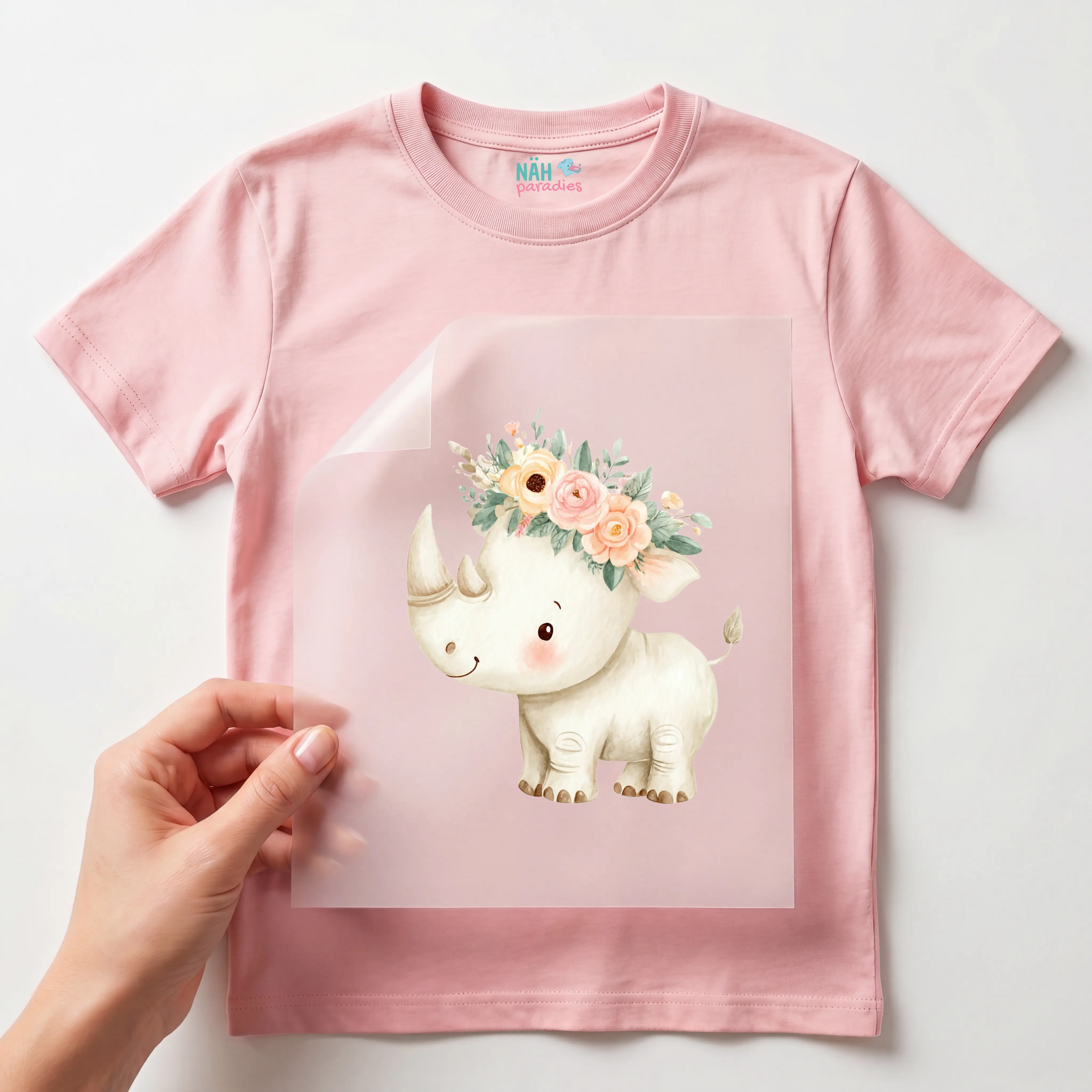 Bügelbild Nashorn mit Blumenkranz