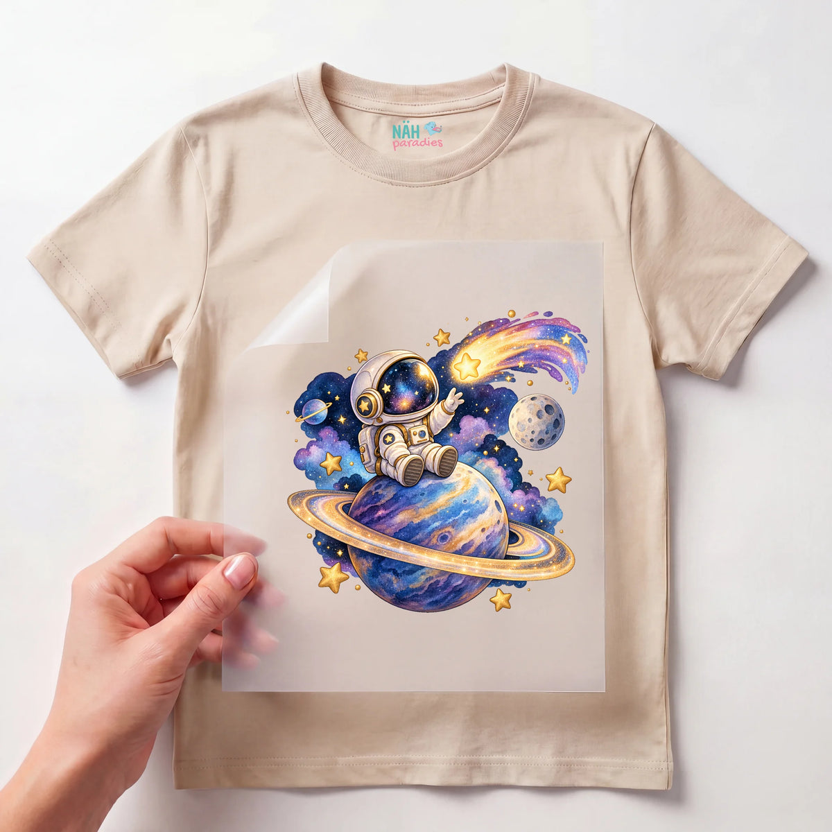 Bügelbild Astronaut auf Saturn mit Sternschnuppe