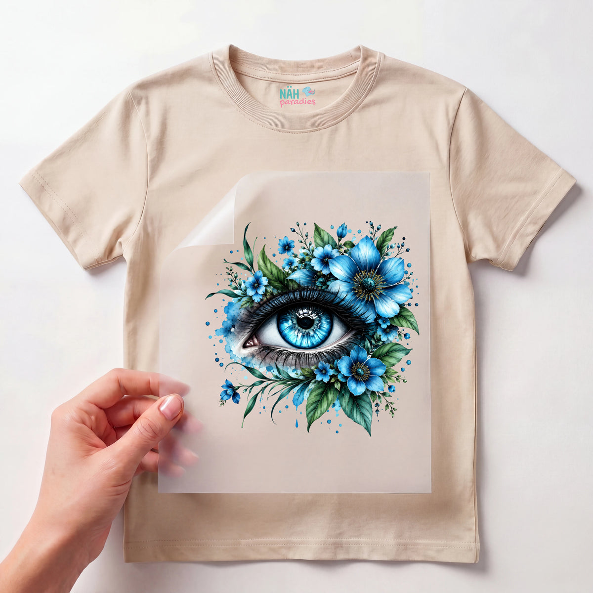 Bügelbild Blaues Auge mit Blumen